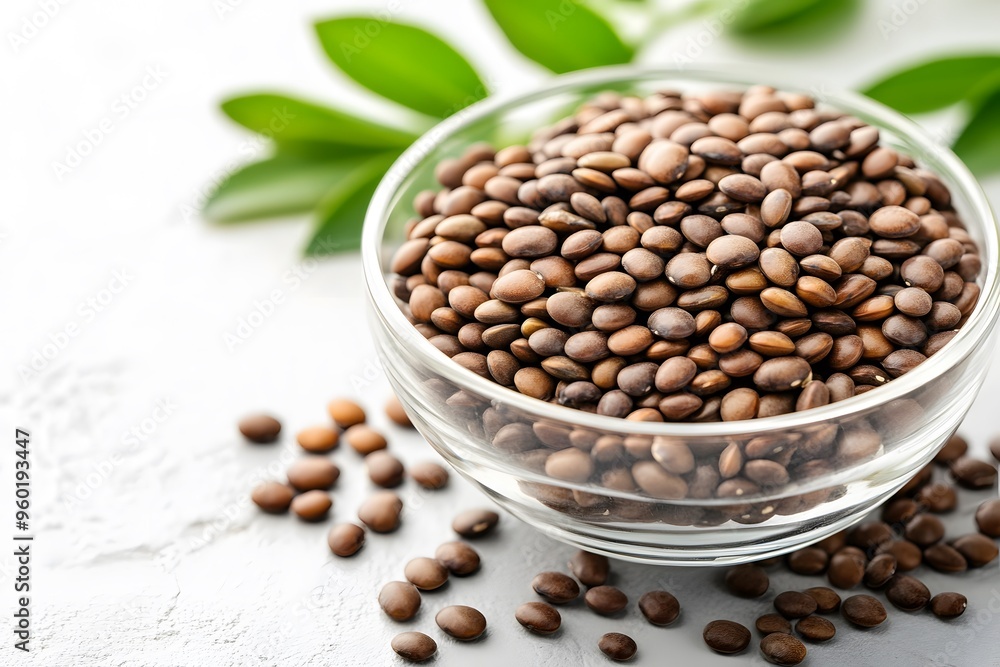 lentils in a glass bowl on a white table lentils in a glass bowl on a white table