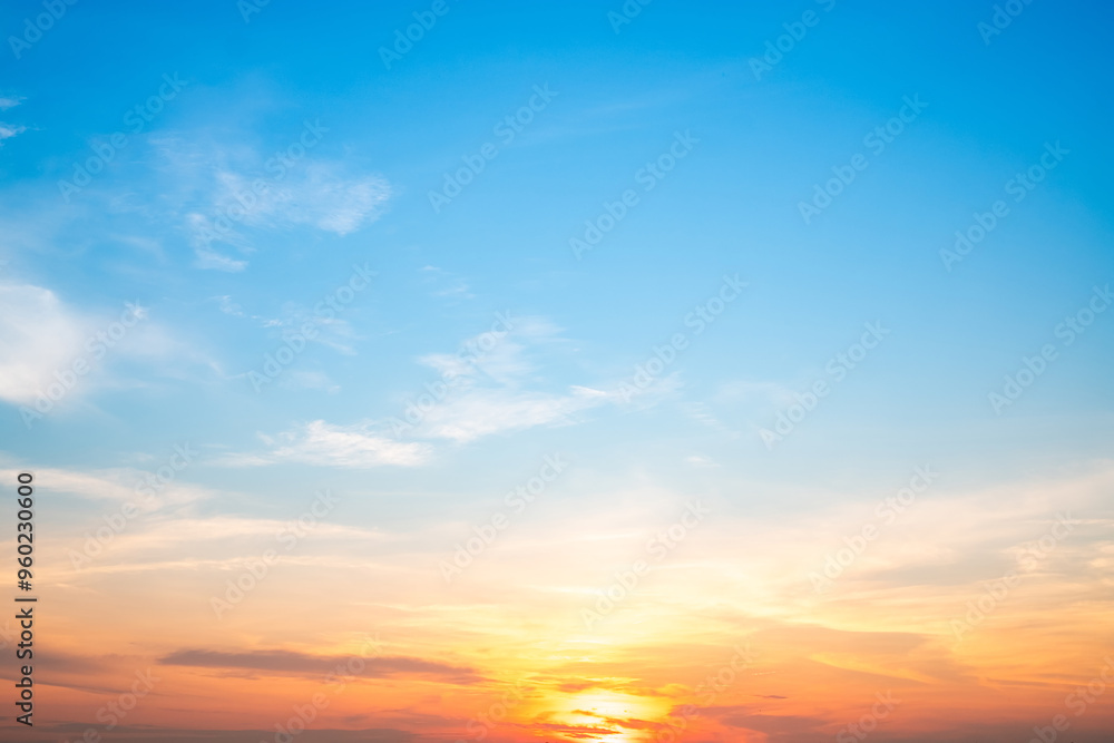 Beautiful , luxury soft gradient orange gold clouds and sunlight on the blue sky perfect for the background, take in everning,Twilight, Large size, high definition landscape photo Beautiful , luxury soft gradient orange gold clouds and sunlight on the blue sky perfect for the background, take in everning,Twilight, Large size, high definition landscape photo