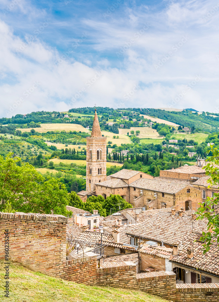 Obraz premium A view across rooftops towards the outskirts of the city in Urbino, Italy in summertime