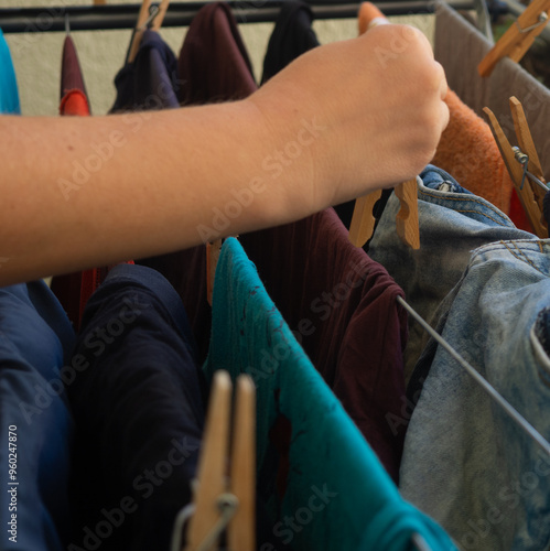 hanging clothes on the balcony