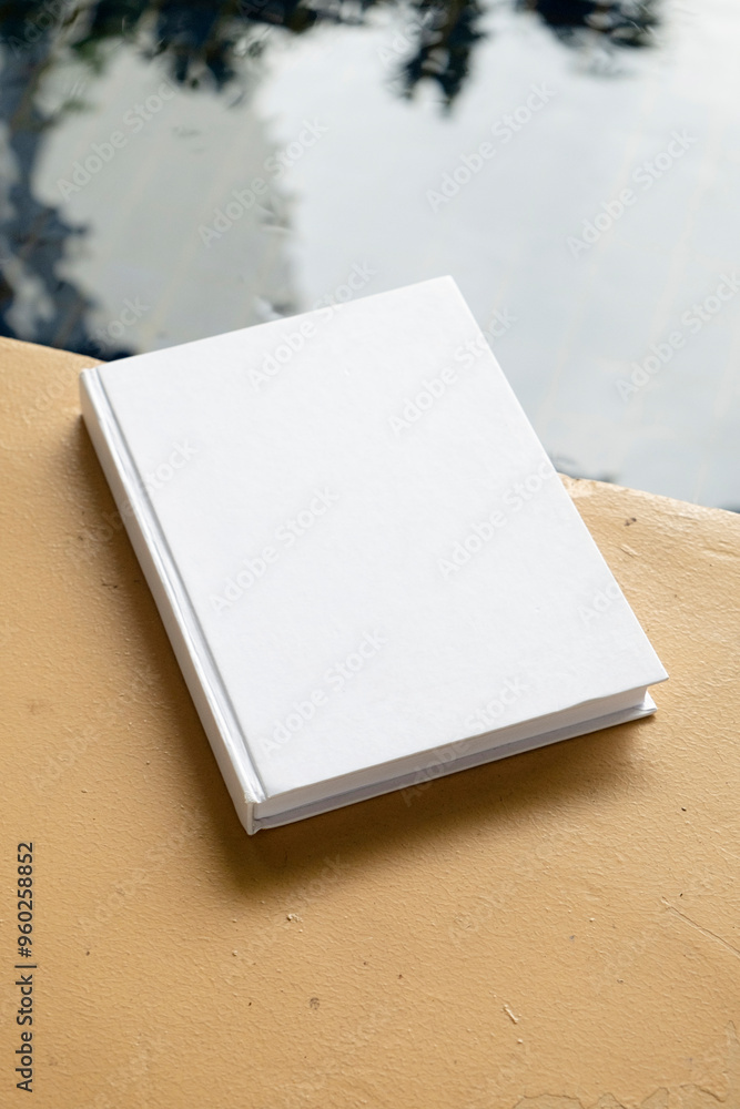 book mockup on wooden floor near pool or pond book mockup on wooden floor near pool or pond