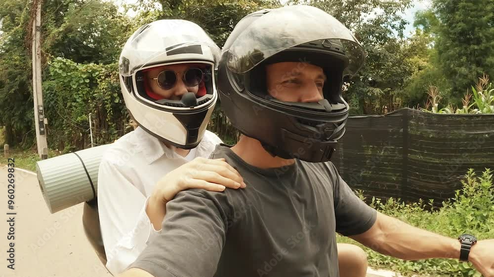 Selfie of Couple Riding a Motorbike in the Mountains of Northern Thailand, Travel Adventure, Romantic Journey, Exploring Scenic Landscapes Concept Selfie of Couple Riding a Motorbike in the Mountains of Northern Thailand, Travel Adventure, Romantic Journey, Exploring Scenic Landscapes Concept