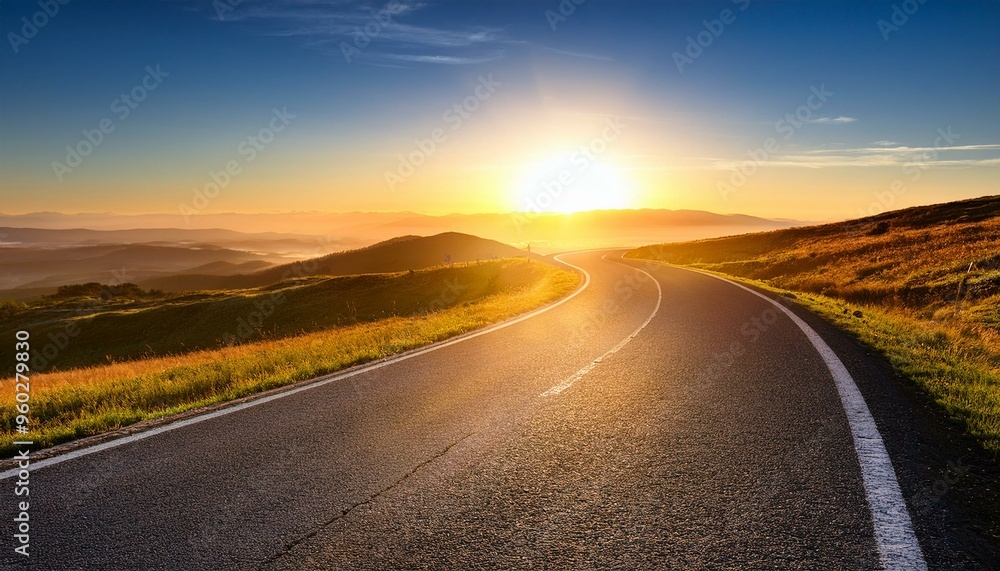 Fototapeta premium Bright sunrise illuminating a winding road, symbolizing the start of a new path beginning journey way