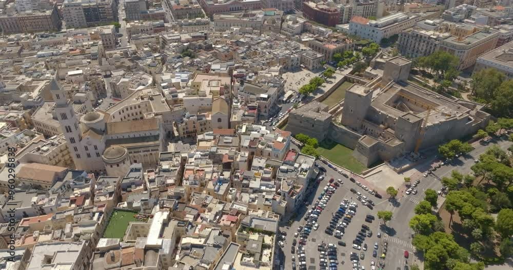 Aerial view of the Norman-Swabian castle and Basilica of Saint Sabinus located in Bari, Puglia, Italy. The fortress and Bari Cathedral are located in the historic center of the city, called Old Bari. Aerial view of the Norman-Swabian castle and Basilica of Saint Sabinus located in Bari, Puglia, Italy. The fortress and Bari Cathedral are located in the historic center of the city, called Old Bari.