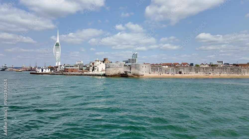 Portsmouth England UK. 27.08.2024. Video. Entering Portsmouth Harbour by sea viewing The Round Tower Old Portsmouth Gunwharf Quays and Spinaker Tower Portsmouth England UK. 27.08.2024. Video. Entering Portsmouth Harbour by sea viewing The Round Tower Old Portsmouth Gunwharf Quays and Spinaker Tower