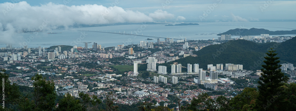 An aerial view of Penang island, travel destinations, downtown district, cityscape or landscaped from Penang hill, Malaysia, panoramic skyscraper. tower and apartment. An aerial view of Penang island, travel destinations, downtown district, cityscape or landscaped from Penang hill, Malaysia, panoramic skyscraper. tower and apartment.