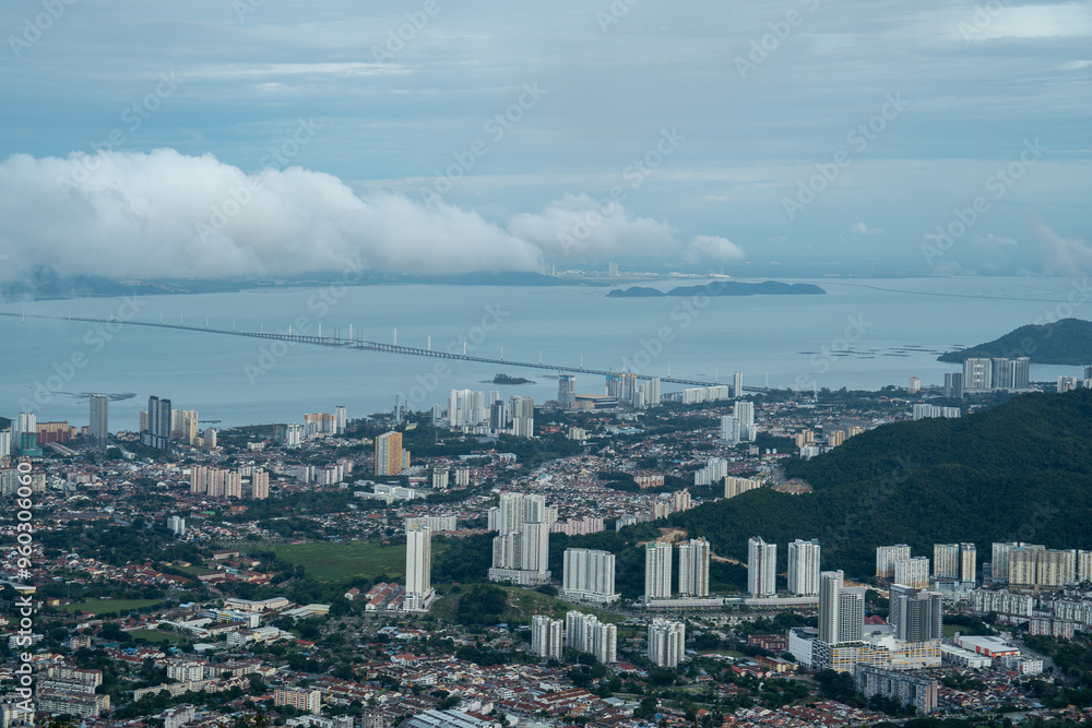 An aerial view of Penang island, travel destinations, downtown district, cityscape or landscaped from Penang hill, Malaysia, panoramic skyscraper. tower and apartment. An aerial view of Penang island, travel destinations, downtown district, cityscape or landscaped from Penang hill, Malaysia, panoramic skyscraper. tower and apartment.