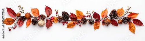 A beautiful arrangement of autumn leaves, pine cones, and berries, perfect for seasonal decoration and cozy fall vibes.