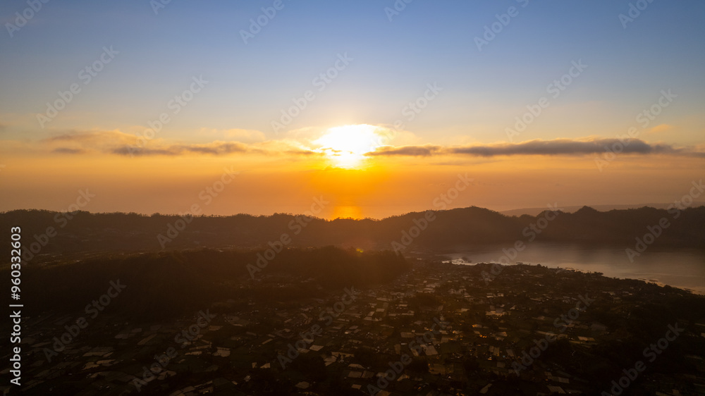 Stunning sunrise as seen from the famous volcano, Batur Mountain in Bali, Indonesia Stunning sunrise as seen from the famous volcano, Batur Mountain in Bali, Indonesia