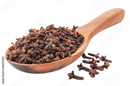 Wallpaper Mural A wooden spoon filled with aromatic star anise seeds, showcasing their unique shape and rich brown color against a white background. Torontodigital.ca