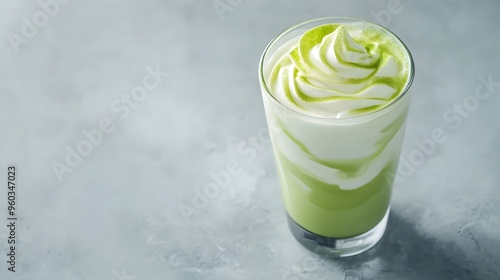 Vibrant Matcha Latte with Vanilla Twist Served in Elegant Glass with Swirling Pattern