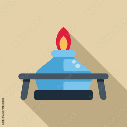 Alcohol burner with blue glass container burning with red and yellow flame