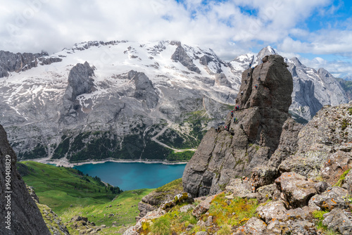 Via Ferrata delle Trincee, Dolomites, Val di Fassa Valley. Fedaia lake and Marmolada massif group with glacier background