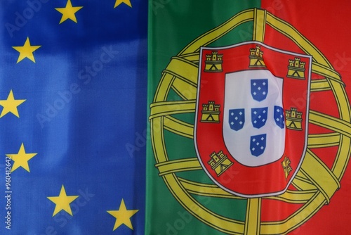 European Union and Portugal flags displayed together at an event photo