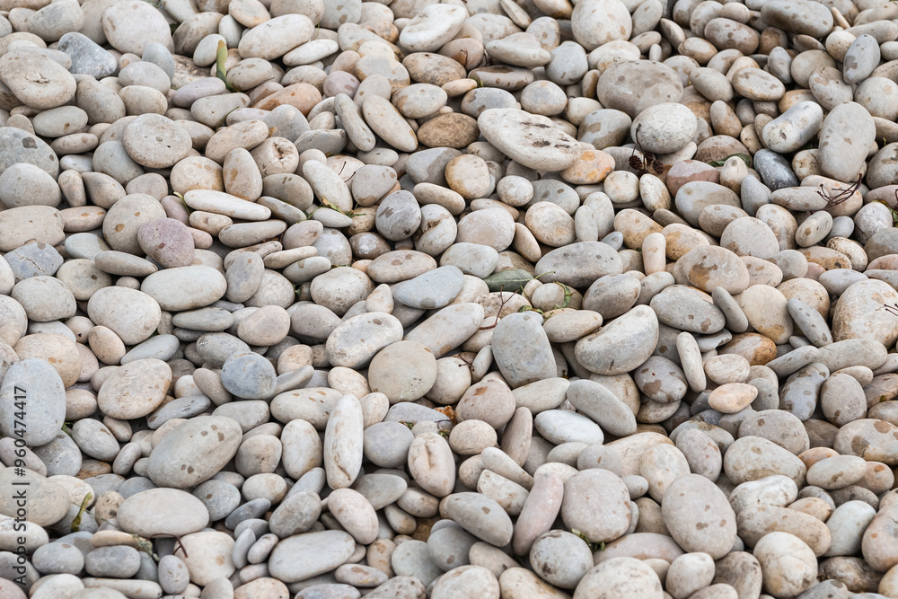 gray stone background small pebbles round, background close-up river bank gray stone background small pebbles round, background close-up river bank