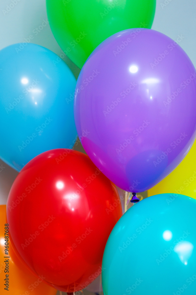 A fountain, a bunch of colorful shiny helium balloons. A fountain, a bunch of colorful shiny helium balloons.
