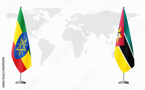 Ethiopia and Mozambique flags for official meeting against background of world map. photo