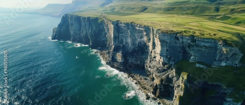 Majestic Coastal Cliffside Aerial View in - Dramatic Drops, Ocean Waves, Rocky Outcrops