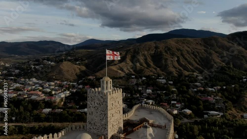 Stunning drone footage of Akhaltsikhe, Georgia, showcasing its ancient Rabati Fortress, scenic landscape, and historic architecture from a bird's-eye perspective. Perfect for travel and history stock 