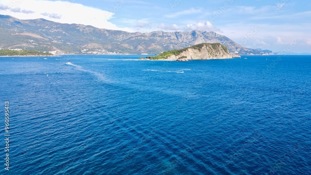 drone photo of the adriatic sea and mountains in the back drone photo of the adriatic sea and mountains in the back