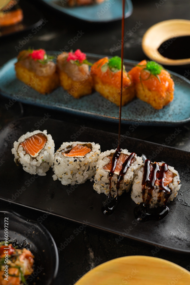 Sushi on Black Stone Table Sushi on Black Stone Table