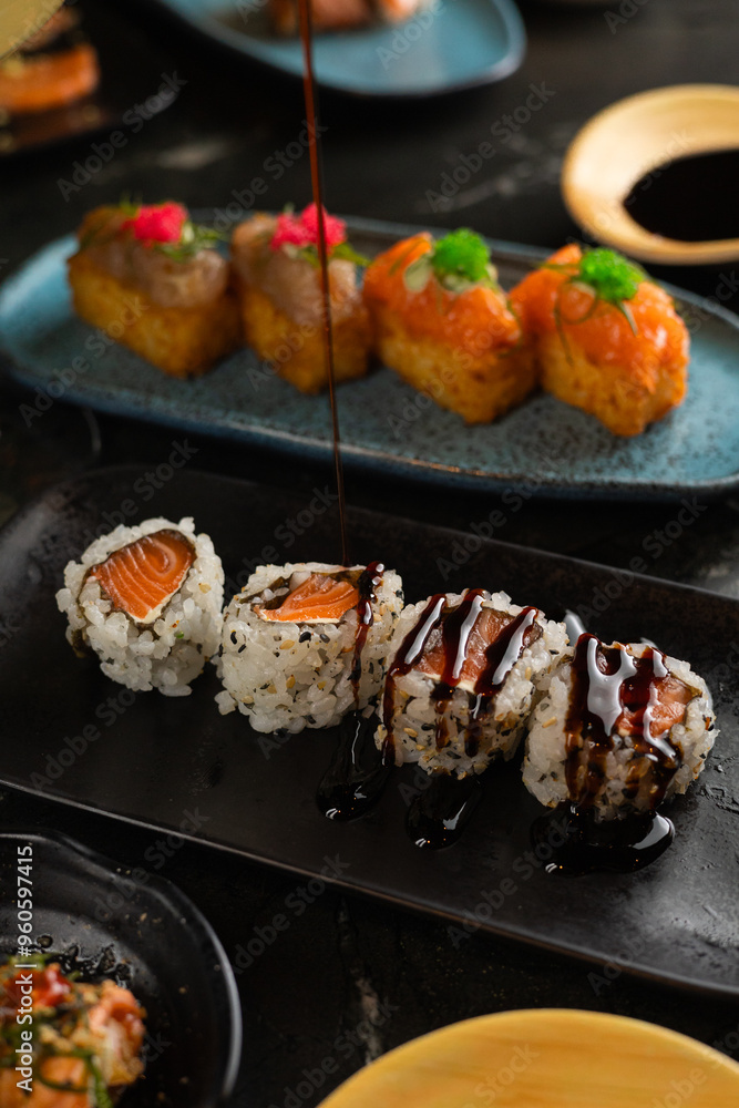 Sushi on Black Stone Table Sushi on Black Stone Table