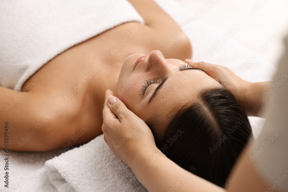 Attractive woman enjoying face massage, closeup. Beauty procedure Attractive woman enjoying face massage, closeup. Beauty procedure