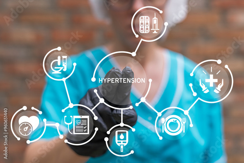 Cardiologist working on virtual touch screen presses word: HYPERTENSION. Hypertension Heart Disease Medical concept. Hypertensive crisis examination and treatment.