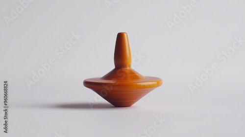 Close-up Shot of Classic Toy Spinning Top with Vibrant Colors and Geometric Designs