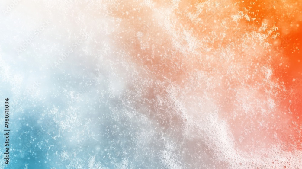 Fototapeta premium Abstract close-up of vibrant blue and orange foam swirling together, creating a dynamic and energetic visual.