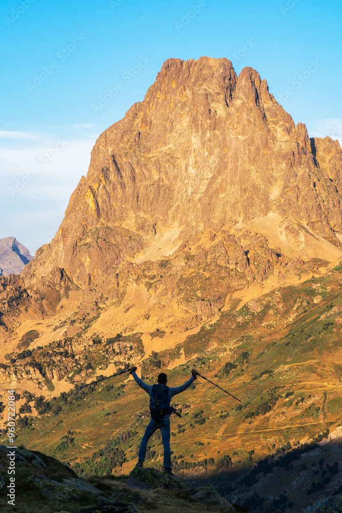 Back view of unrecognizable man hiking in the French Pyrenees Back view of unrecognizable man hiking in the French Pyrenees