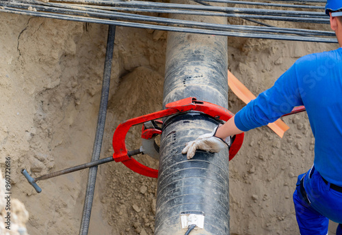 Attempt to make a cut in a gas pipeline with a mechanical knife for removing insulation. Concept of a technical error