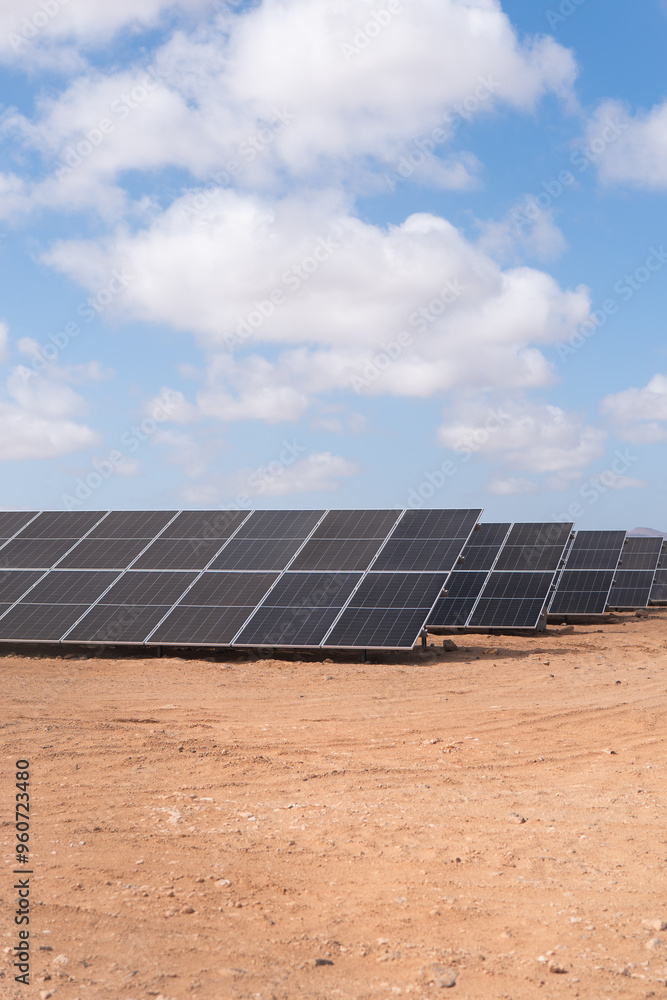 Solar panels spread across a desert landscape Solar panels spread across a desert landscape