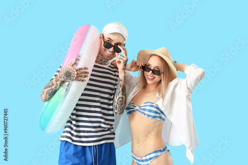 Young couple with inflatabl...