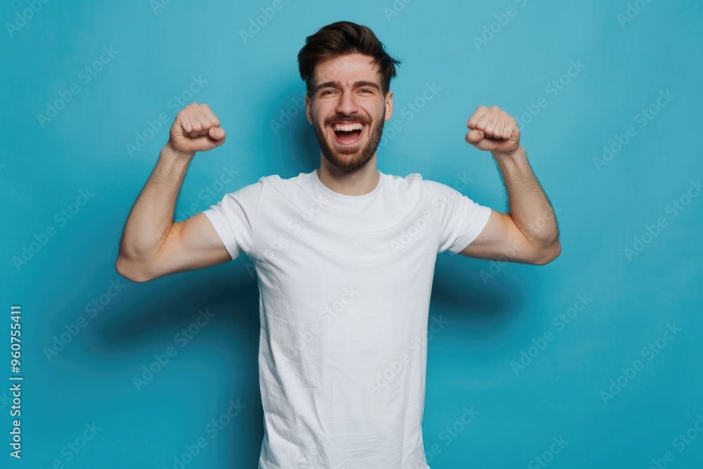 A person standing with arms up, wearing a white t-shirt A person standing with arms up, wearing a white t-shirt