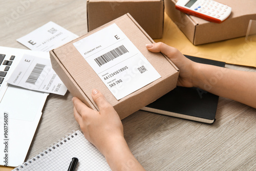 Hands holding economy mail ...
