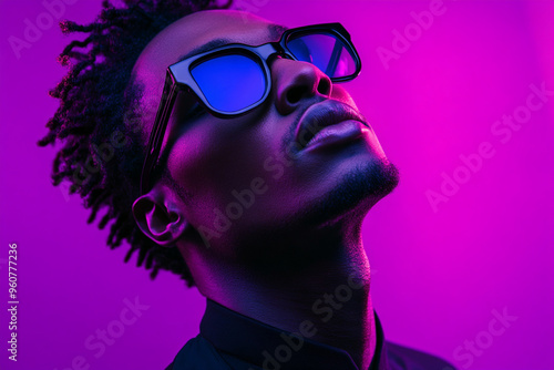 Fashionable Man with Black Eyewear and Solid Neon Purple Details, Captured in a Trendy Lifestyle Portrait