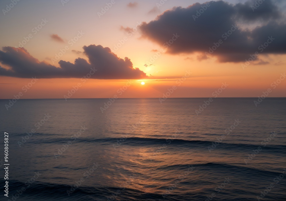 Fototapeta premium Sunset Over Calm Ocean Waves
