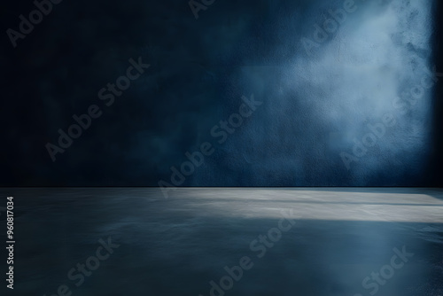 Minimalist room with dark blue walls and polished concrete floor, moody lighting casting soft shadows