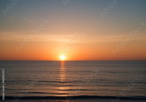 Sunset Over Calm Ocean Waves