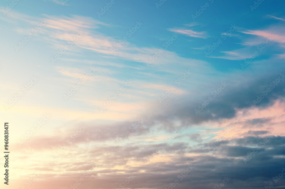 Sunset sky background in vivid tones, dramatic panoramic sunset sky with fluffy clouds, sunset sky landscape Sunset sky background in vivid tones, dramatic panoramic sunset sky with fluffy clouds, sunset sky landscape