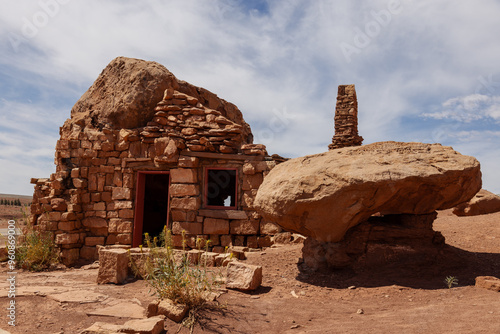 An old abandoned rock masonry dwelling at the feet of Vermilion Cliffs National Monument along US 89A. Near Page Arizona. photo