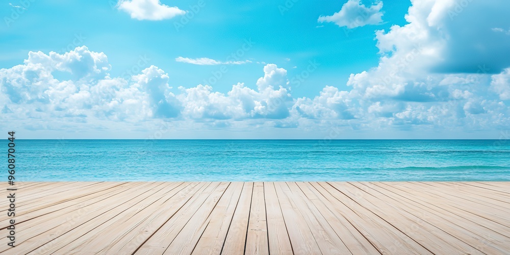 Fototapeta premium empty wooden flooring deck in front and blue summer sky with clouds and sea or ocean with turquoise water and waves in the background summer vacation sea shoreline with deck floor