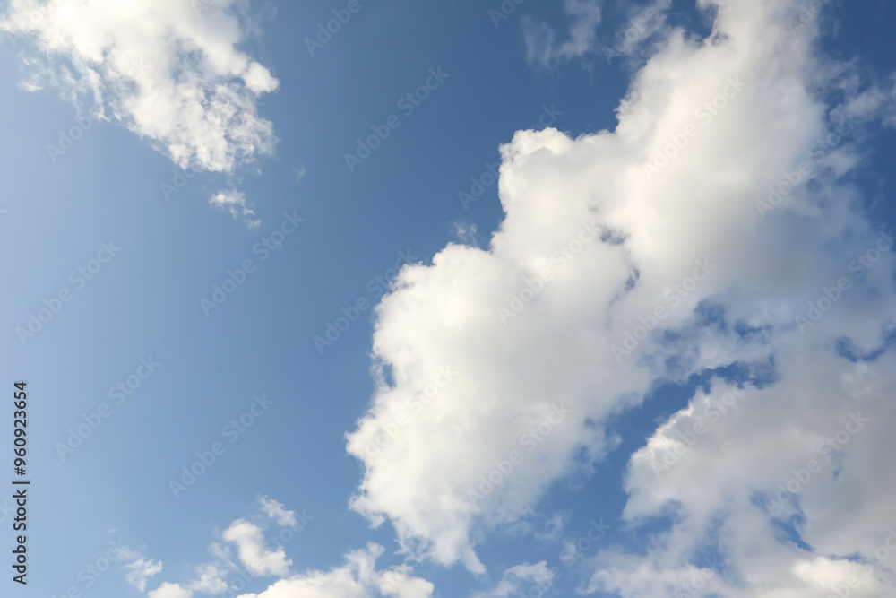 Picturesque view of blue sky with fluffy clouds Picturesque view of blue sky with fluffy clouds