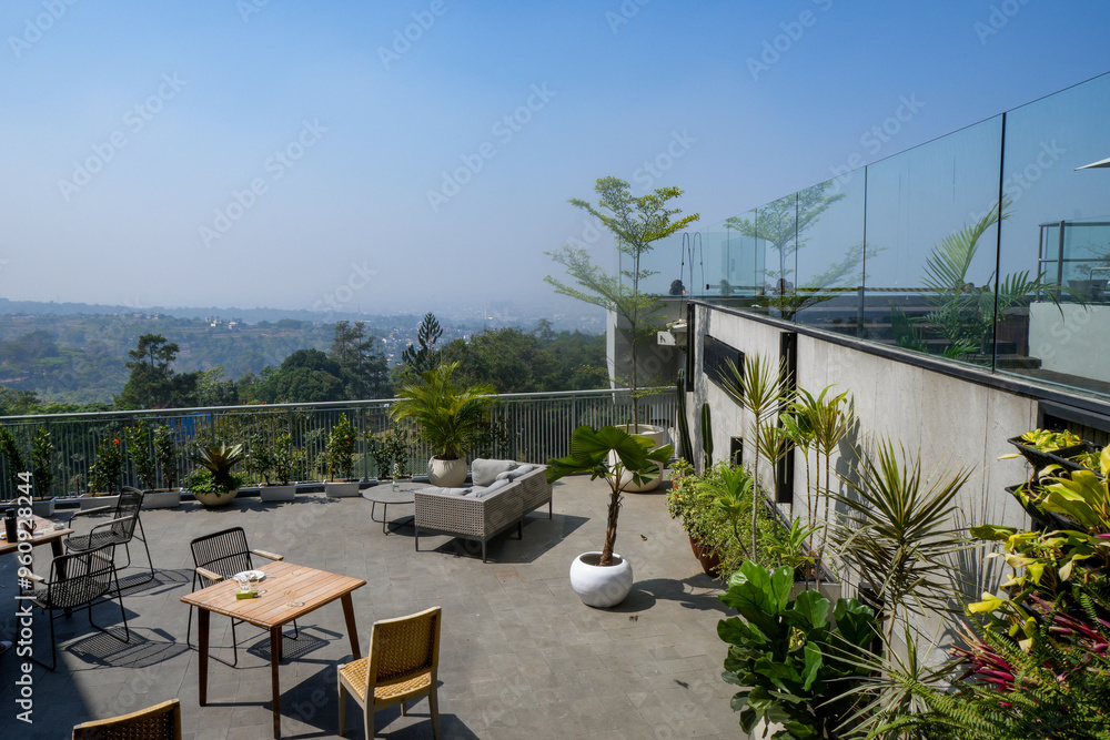 Sky bar, a restaurant or cafe lounge terrace with dinner table on rooftop of hotel Sky bar, a restaurant or cafe lounge terrace with dinner table on rooftop of hotel