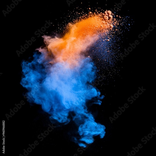 Orange and Blue Powder Explosion on Black Background.