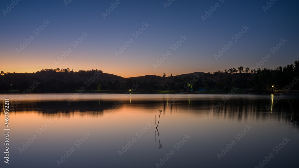 Puddingstone Lake reflects the beautiful surroundings in the morning sun Puddingstone Lake reflects the beautiful surroundings in the morning sun