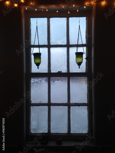 Tableau sur toile Frosted Windows With Green Hanging Lanterns