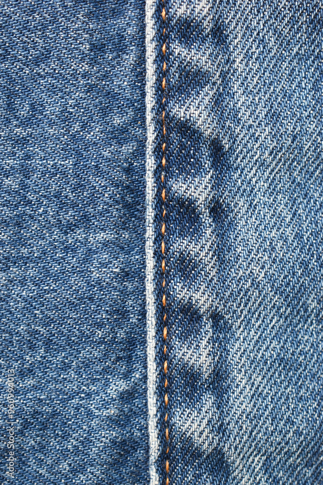 seam of blue denim texture background, jean fashion style seam of blue denim texture background, jean fashion style