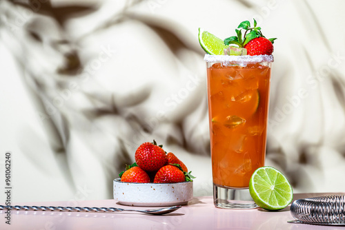 Strawberry alcohol cocktail drink with tequila, grapefruit, lime juice,  mint and ice. Beige pink background., hard light photo